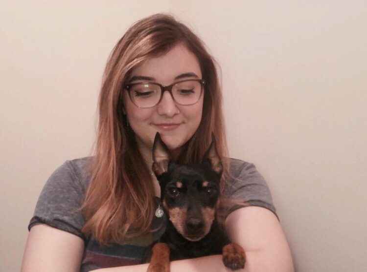Blog Little About Amow Design feature image, Kaylee with her dog