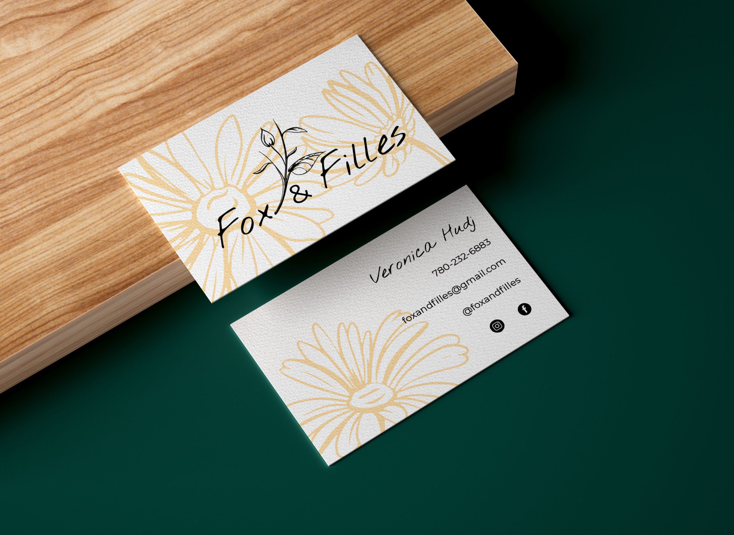 Business cards laid out on a mock up